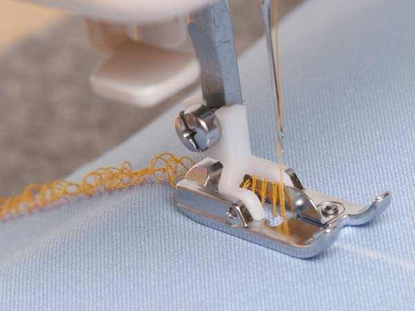  Máquina de coser pie para boucle.