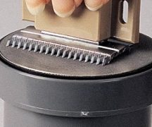  Afilador de cuchillas para cortadoras de cabello.